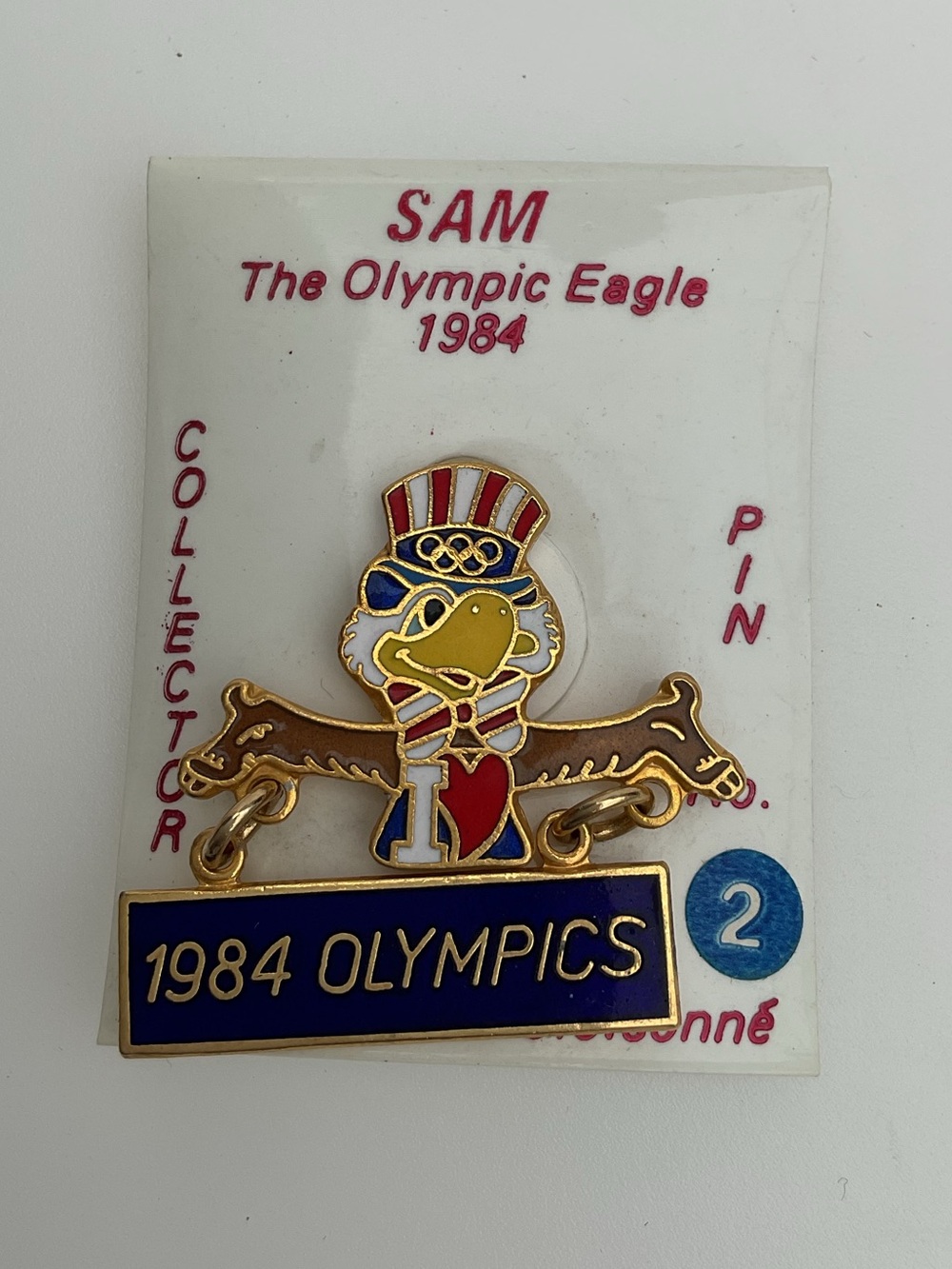 SAM 1984 Olympics Enamel Pin - Red, White, Blue, Gold